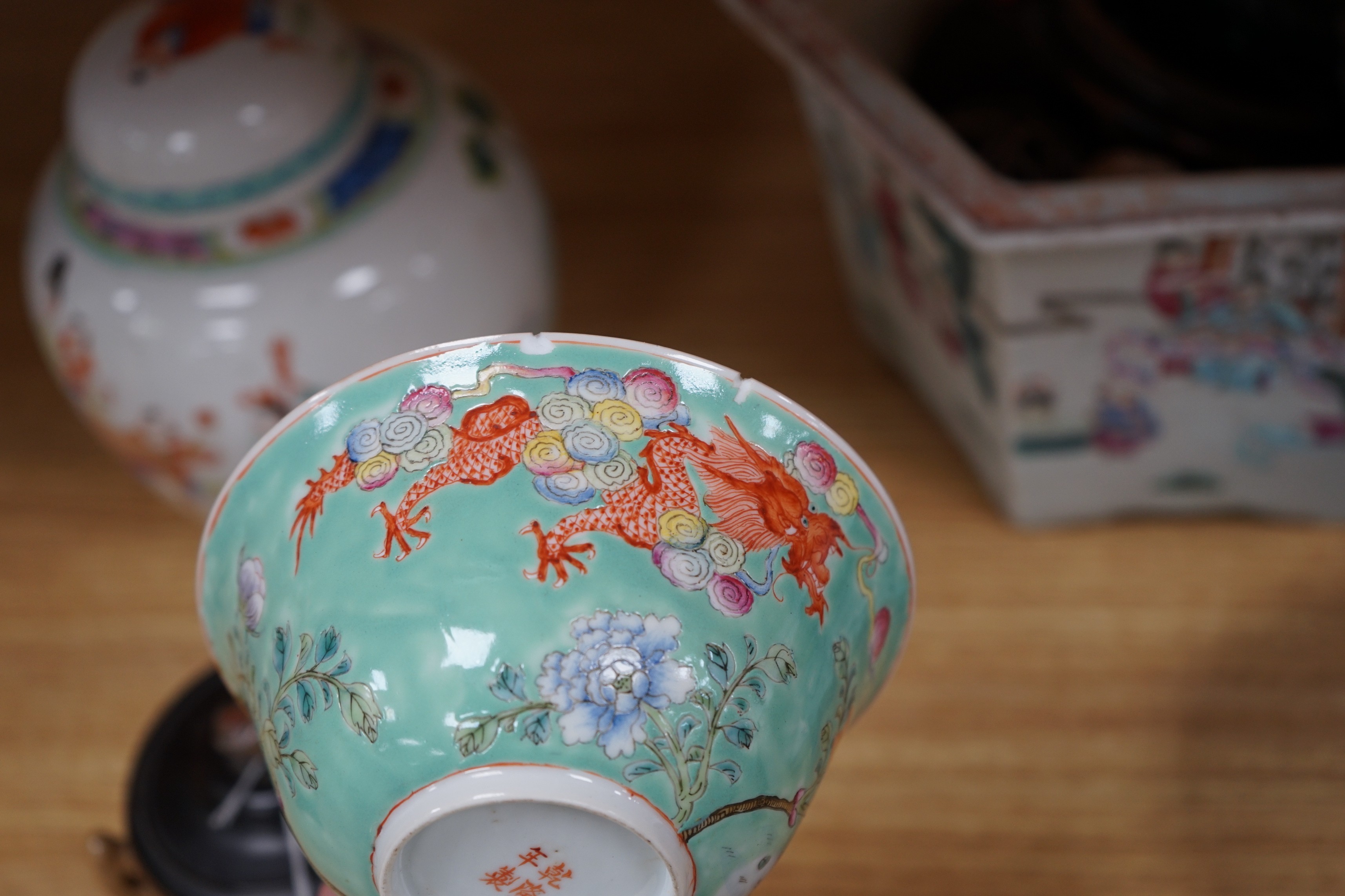 A 19th century Chinese famille rose planter, a jar and cover, two bowls and a crackle ware censer and wood cover, plater 16 cms high